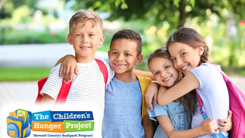 Grouping of kids with Children's Hunger Project logo