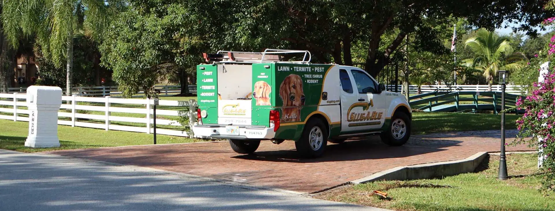 Slug-A-Bug Pest Control truck arriving at a residential home in Melbourne Florida
