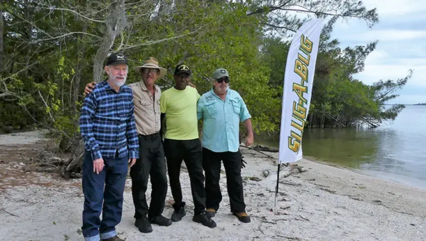 A group on a Spoil Island during a cleanup