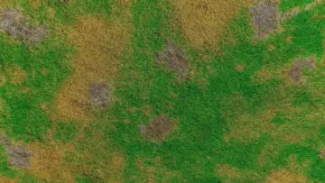 An overhead view of a green lawn with several dead, yellowish-brown spots, illustrating the common homeowner concern, "Why Are There Brown Patches on My Lawn?"